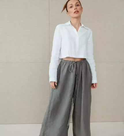 Sofa Killer pilkos spalvos linininės kelnės Doha