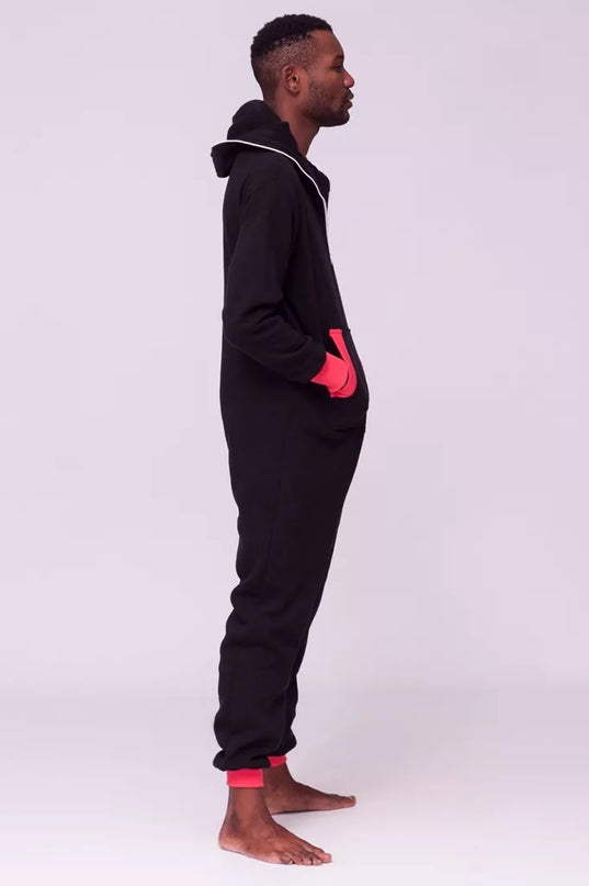 Sofa Killer juodas kombinezonas su koralo rankogaliais