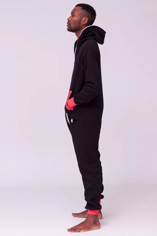 Sofa Killer juodas kombinezonas su koralo rankogaliais